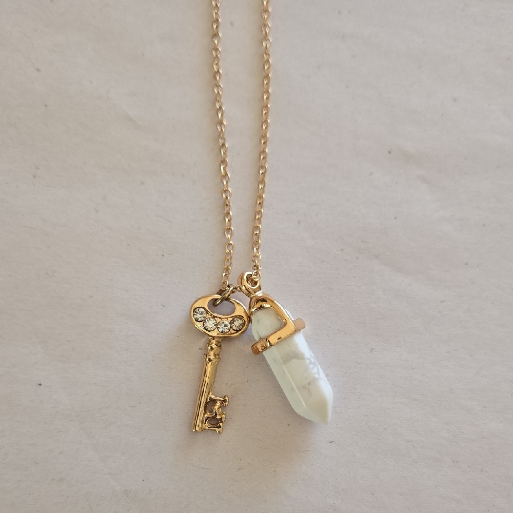 Elegant Gold Tone and White Crystal Key Necklace